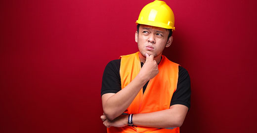 Construction worker thinking about career options